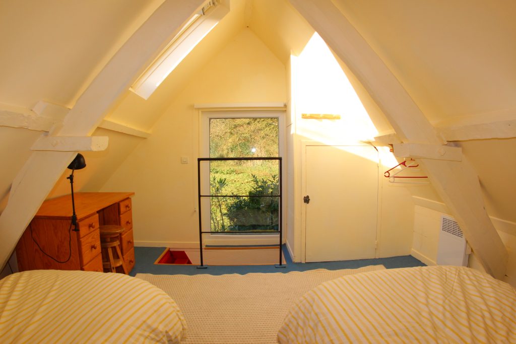 First bedroom of La Boulangerie cottage at Château de Flottemanville, room view