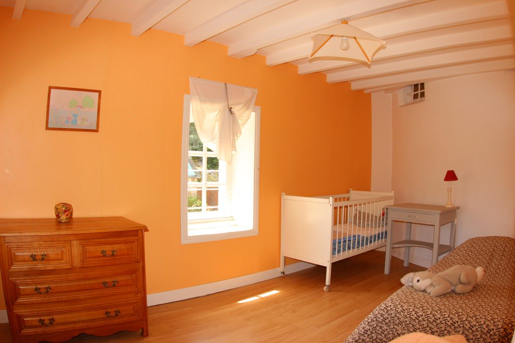 Annexe bedroom of La Ferme cottage at Château de Flottemanville
