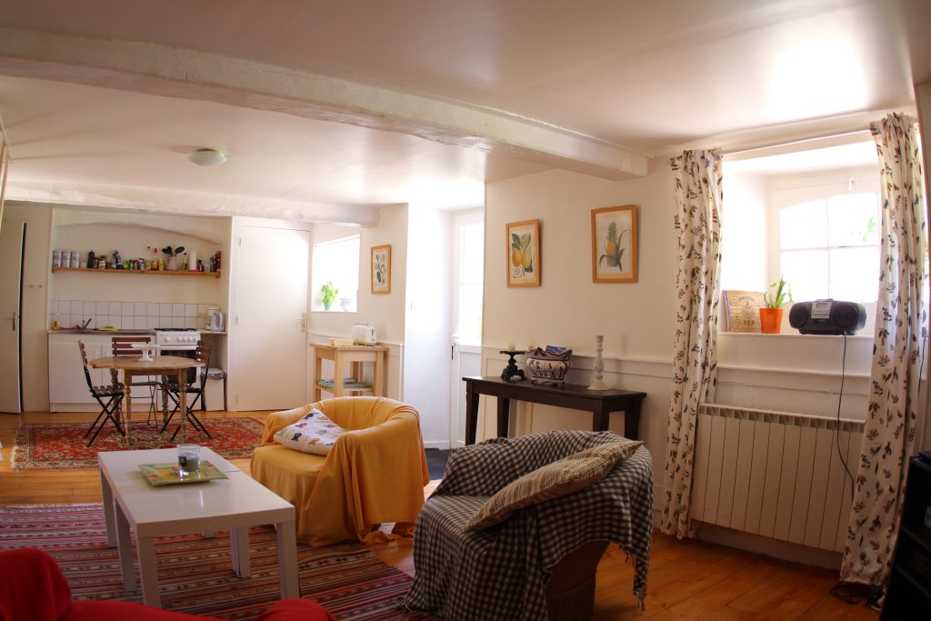 Living room of La Serre cottage at Château de Flottemanville