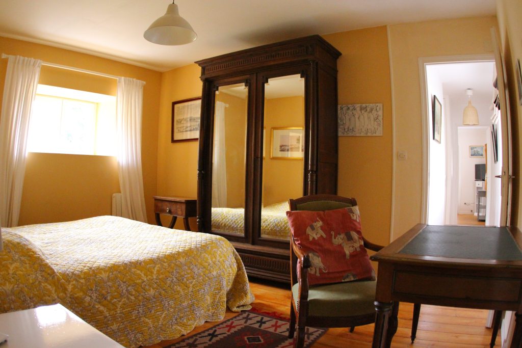 First bedroom in Les Pommiers cottage at Château de Flottemanville