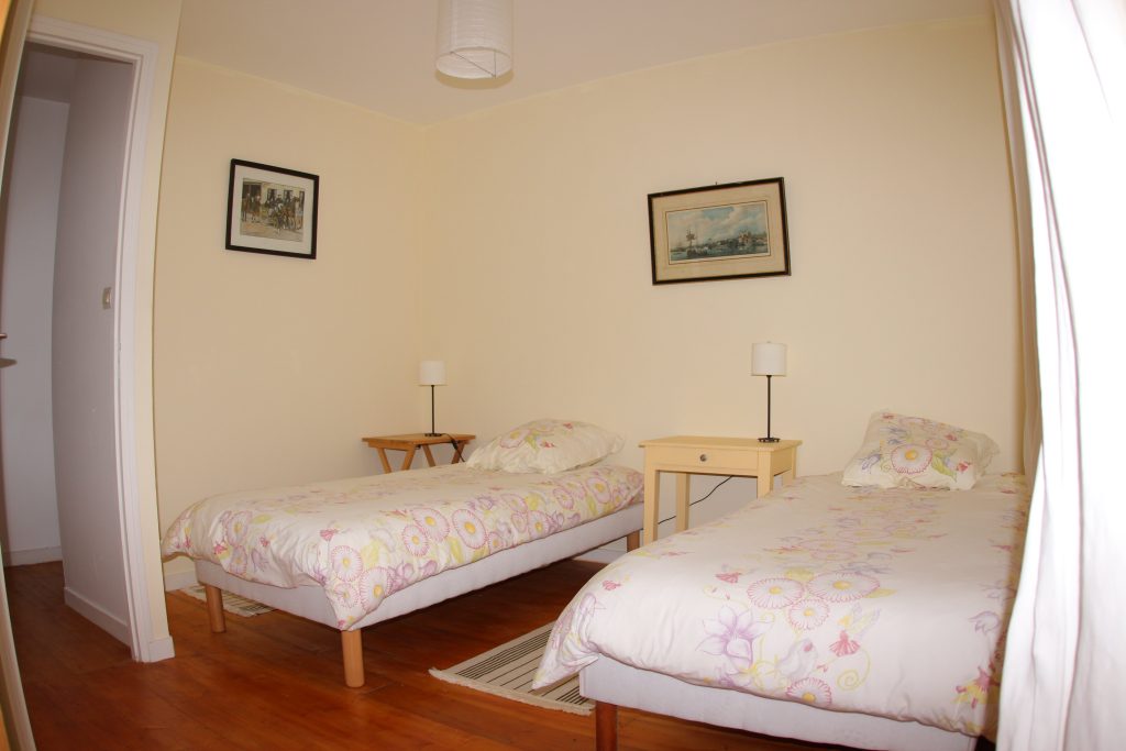 Bedroom in Les Pommiers cottage at Château de Flottemanville